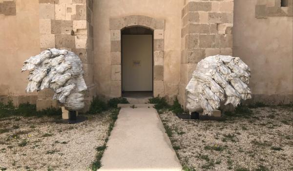 Volti con cavalli - Scultura di Davide Dall'Osso Volti con cavalli - Scultura di Davide Dall'Osso